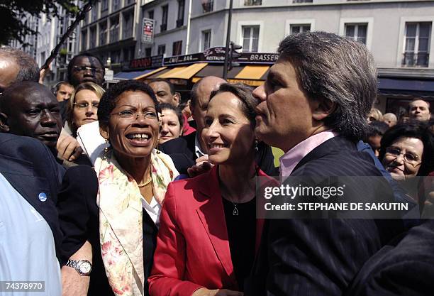 French former socialist presidential candidate Segolene Royal talks with supporters during a support visit to Socialist party's candidates for the...