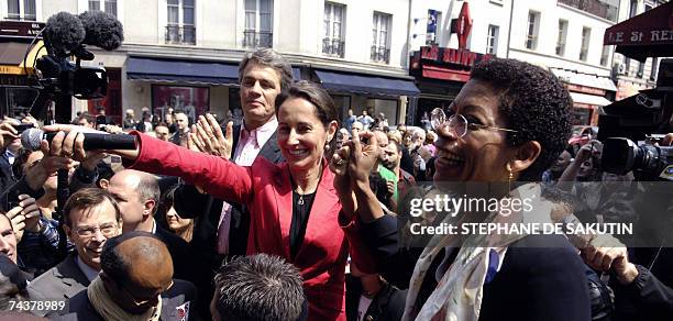 French former socialist presidential candidate Segolene Royal gestures to supporters during a support visit to Socialist party's candidates for the...