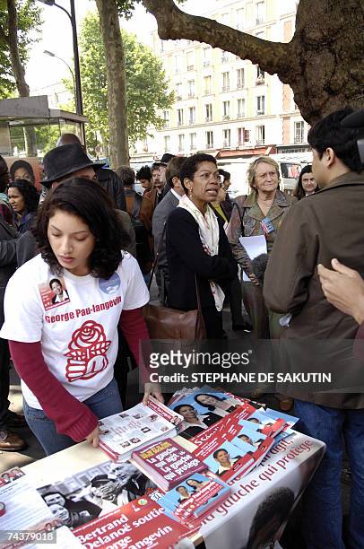 French Socialist party's candidate for the up-coming June's elections, George Pau-Langevin talks with people during a campaign visit, 02 June 2007 in...