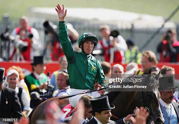 Frankie Dettori celebrates winning the Derby during The Vodafone Derby Race run at Epsom Racecourse on June 2 2007, in Epsom, England.