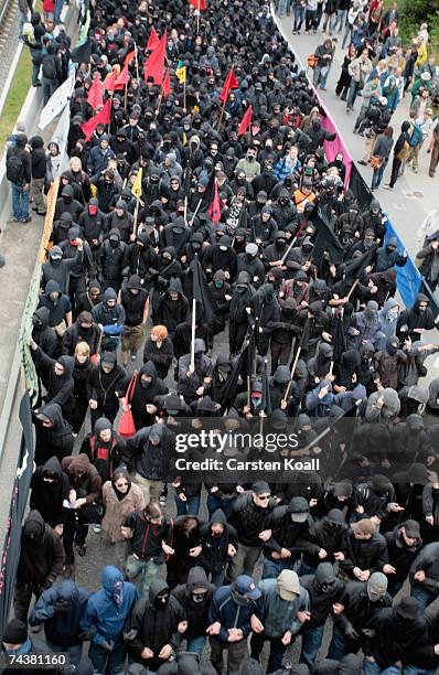 Demonstrators make their way through the city during the Opening Demonstration of G8 opponents on June 2, 2007 in Rostock, Germany. Roughly 25,000...