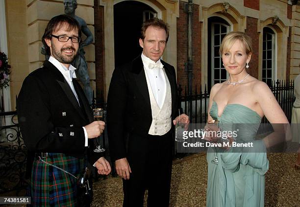 Rowling and her husband with Ralph Fiennes arrive at the Raisa Gorbachev Foundation Party at the Hampton Court Palace on June 2, 2007 in Richmond...
