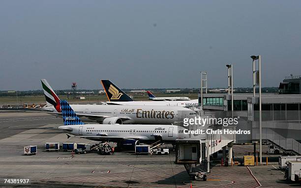 Passenger jets sit on the tarmac at John F. Kennedy Airport June 2, 2007 in New York City. Today authorities charged four men, Russell Defreitas,...