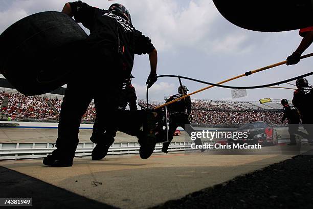 Kevin Conway, driver of the Z-Line Designs Chevrolet, pits during the NASCAR Busch Series Dover 200 on June 2, 2007 at Dover International Speedway...