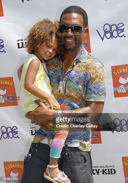 Actor Bill Bellamy and daughter Bailey Ivory-Rose Bellamy pose at the Kidstock Music and Art Festival at Greystone Mansion June 2, 2007 in Los...
