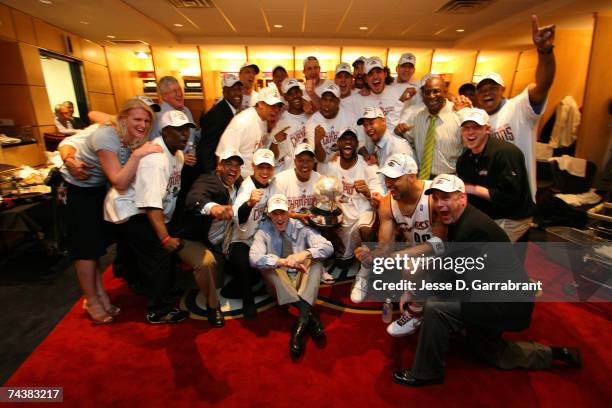 The Cleveland Cavaliers gather for a group shot in the locker room after defeating the Detroit Pistons in Game Six of the Eastern Conference Finals...