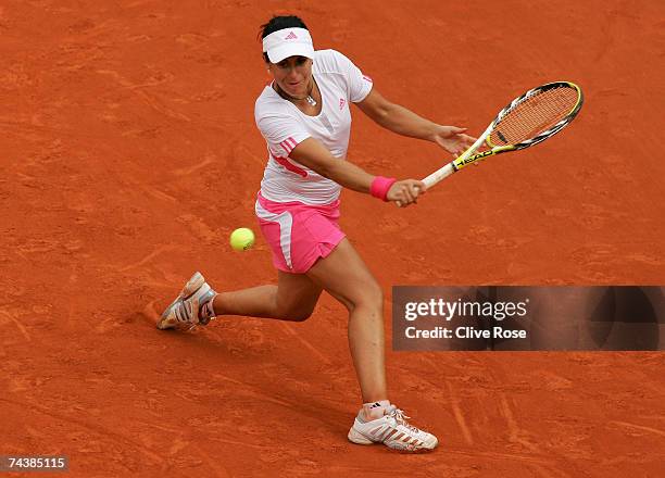 Anabel Medina Garrigues of Spain in action against Ana Ivanovic of Serbia during the Women's Singles 4th round match on day eight of the French Open...