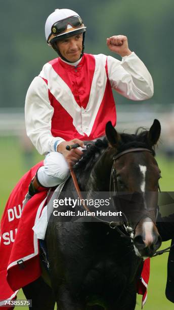 Frankie Dettori and Lawman return after landing The Prix Du Jockey Club Mitsubishi Motors run at Chantilly Racecourse on June 3 in Chantilly, France.