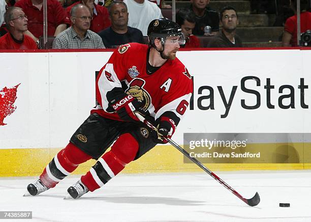 Wade Redden of the Ottawa Senators skates with the puck during Game Three of the 2007 Stanley Cup finals against the Anaheim Ducks on June 2, 2007 at...