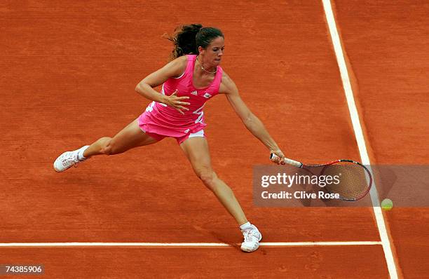 Patty Schnyder of Switzerland in action against Maria Sharapova of Russia during the Women's Singles 4th round match on day eight of the French Open...