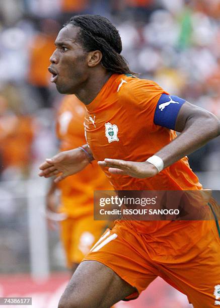 Ivory Coast Elephants striker Didier Drogba jubilates after scoring against Madagascar 03 June 2007 during their African Nations Cup2008 qualifying...