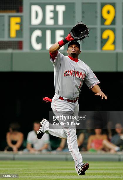 Ken Griffey Jr. #3 of the Cincinnati Reds gets under a fly ball against the Colorado Rockies on June 3, 2007 at Coors Field in Denver, Colorado. The...