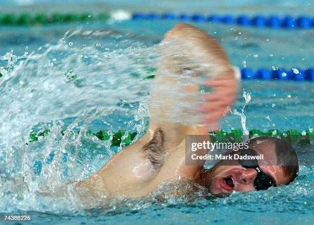 Aaron Hamill of the Saints swims laps during the St Kilda Saints AFL recovery session at St Leonards School in Brighton June 4, 2007 in Melbourne,...