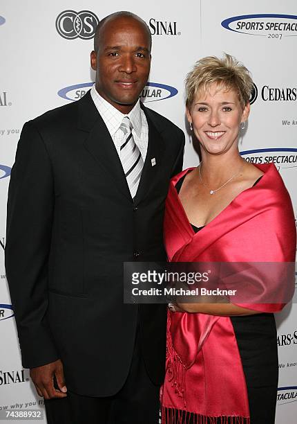 Football head coach Karl Dorrell and wife Kim arrive at the 22nd Annual Sports Spectacular at the Hyatt Regency Century Plaza on June 3, 2007 in...