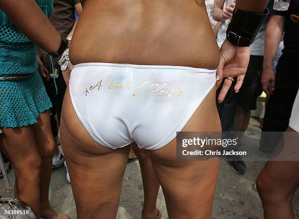 Clubber poses for a photo during the opening matinee at Space nightclub on June 3, 2007 in Spain Ibiza. The matinee is an all day event and starts at...