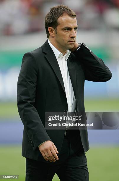 Assistant coach Hansi Flick of Germany looks on before the UEFA EURO 2008 qualifier between Germany and San Marino at the Easy Credit stadium on June...