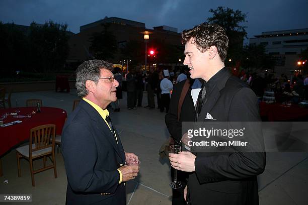 Singer Frankie Avalon with Castmember Actor Erich Bergen talk during the opening night party for "Jersey Boys" the 2006 Tony Award winner for Best...