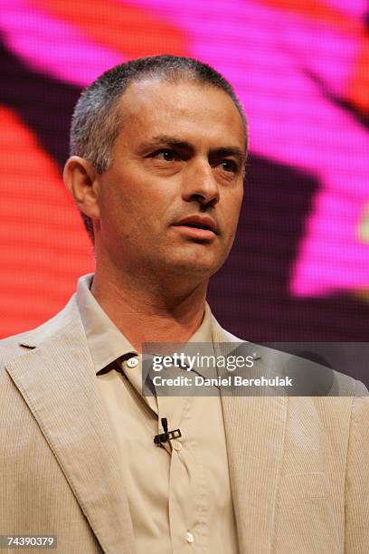 Chelsea Football Club manager Jose Mourinho stands in front of the new 2012 Emblem at the press launch of the 2012 Olympic and Paralympic brand and...