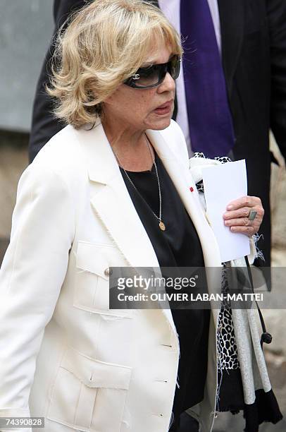 French actress Jeanne Moreau arrives to attend the funeral of French actor and filmmaker Jean-Claude Brialy at Saint-Louis-en-l'Ile's church in Paris...