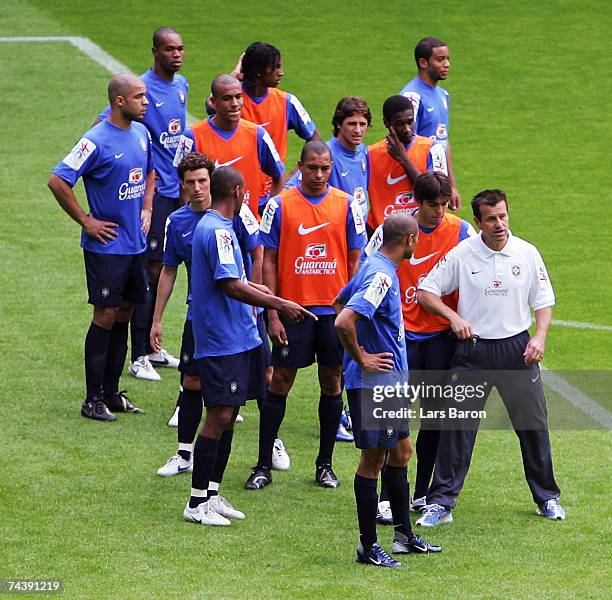 National coach Carlos Dunga gives instructions to Kaka during a Brazil National Team training session at the Signal Iduna Park on June 4, 2007 in...