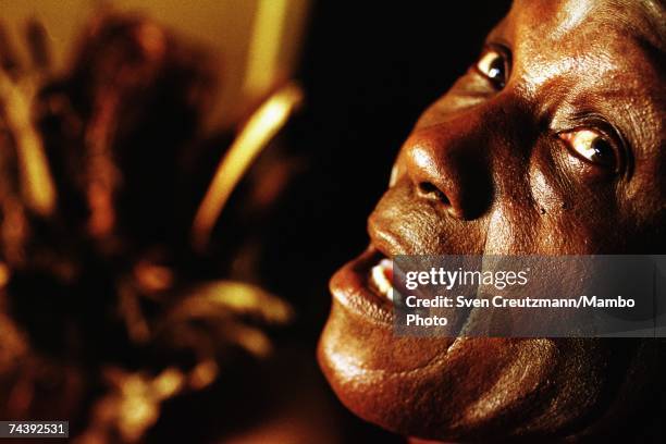 Luis Arere performs an Abacua ceremony in front of a Nganga altar in his home on June 22, 2000 in Centro Havana, Cuba. The fusion and intermingling...