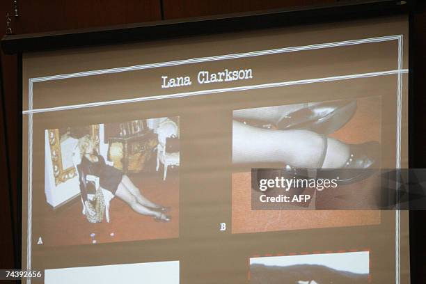 Los Angeles, UNITED STATES: Photographs of the legs of actress Lana Clarkson are projected on a screen during the morning session of the Phil Spector...