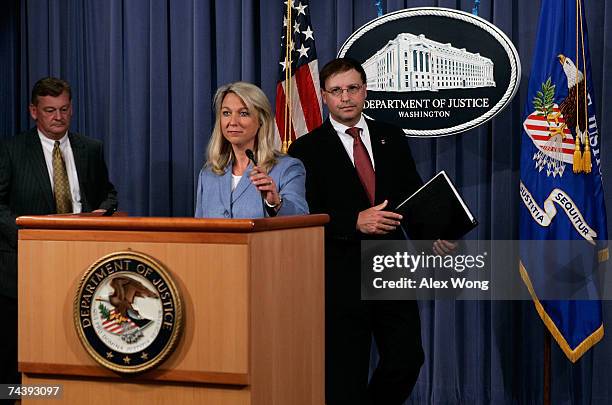 Assistant U.S. Attorney General Alice Fisher takes the podium with U.S. Attorney Chuck Rosenberg of the Eastern District of Virginia, and Assistant...