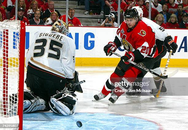 Antoine Vermette of the Ottawa Senators takes a shot on goaltender Jean-Sebastien Giguere of the Anaheim Ducks during the first period of Game Four...