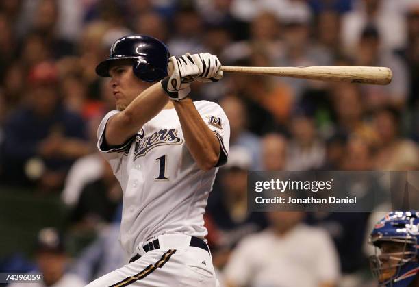 Corey Hart of the Milwaukee Brewers drives in a run in the fourth inning against the Chicago Cubs at Miller Park June 4, 2007 in Milwaukee, Wisconsin.