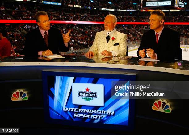 Broadcasters, Bill Clement, Don Cherry and Brett Hull speak during the intermission show of Game Four of the 2007 Stanley Cup finals between the...