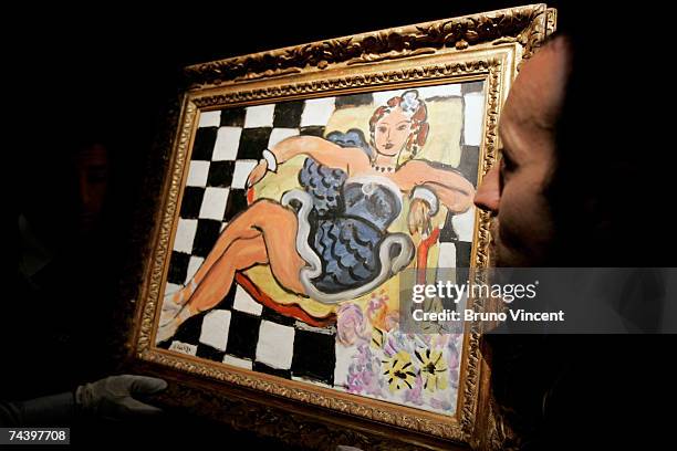 'Danseuse Dans le Fauteuil, Sol en Damier, 1942' by Henri Matisse is displayed at Sotheby's Auction House on June 5, 2007 in London, England. The...