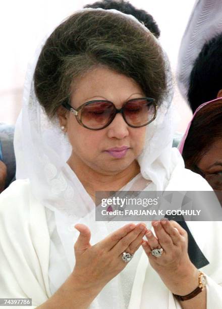 In this picture taken, 30 May 2007, former Bangladeshi Prime Minister Khaleda Zia takes part in a special prayer to mark the death anniversary of her...