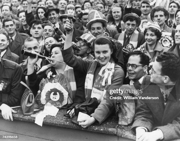 Arsenal fans dressed up at Wembley Stadium to see their team play Newcastle in the FA Cup final, 3rd May 1952.