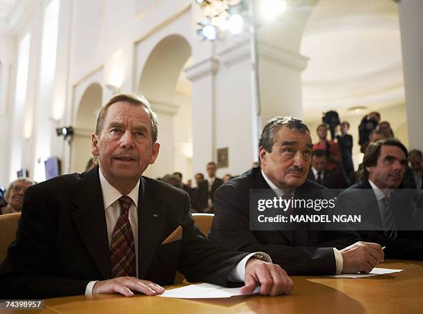 Prague, CZECH REPUBLIC: From L to R Former Czech president Vaclav Havel, Czech Foreign Minister Karel Schwarzenberg, and Former Spanish Prime...