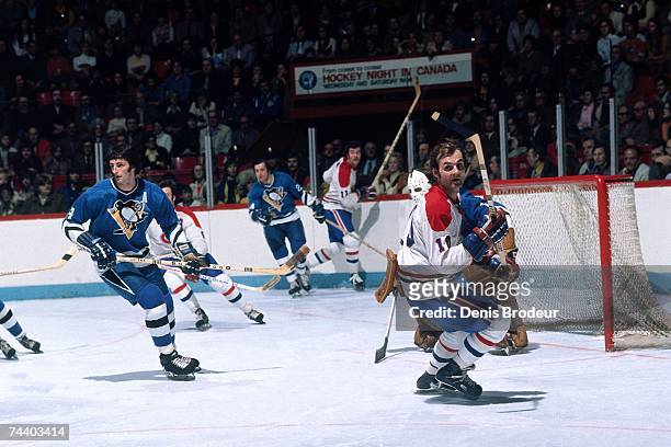 S: Guy Lafleur of the Montreal Canadiens skates against the Pittsburgh Penguins during their NHL game in Montreal, Canada.