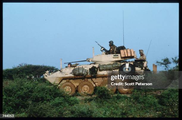 Marines drive a tank while on a peacekeeping mission December 17, 1992 in Baidoa, Somalia. From August to November 1992, an estimated 21,000 of...