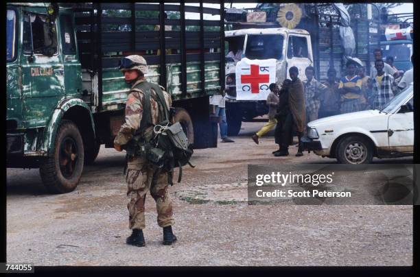 Marine stands while on a peacekeeping mission December 17, 1992 in Baidoa, Somalia. From August to November 1992, an estimated 21,000 of Baidoa's...