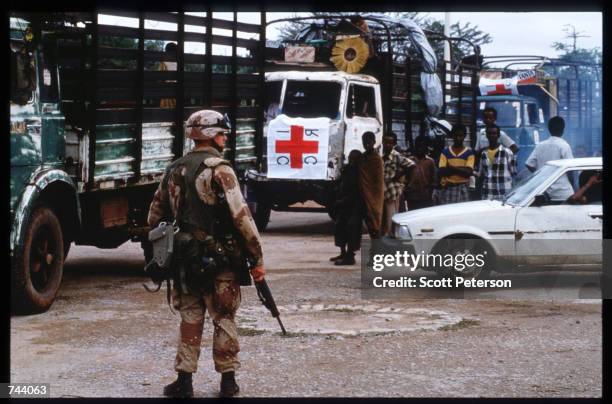 Marine stands while on a peacekeeping mission December 17, 1992 in Baidoa, Somalia. From August to November 1992, an estimated 21,000 of Baidoa's...