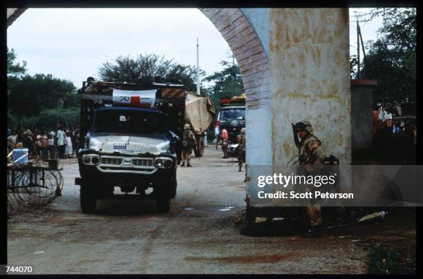 Truck drives under an archway December 17, 1992 in Baidoa, Somalia. From August to November 1992, an estimated 21,000 of Baidoa's 37,000 population...