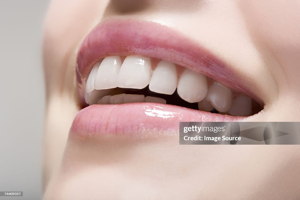 Woman wearing lip gloss