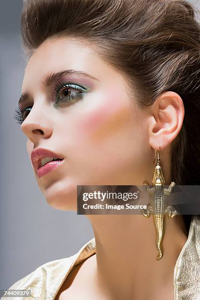 portrait of a young woman - earrings stock pictures, royalty-free photos & images