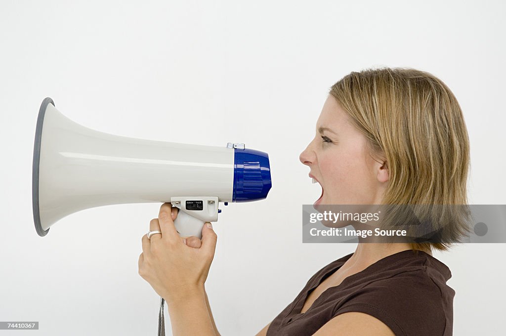 Woman using loudspeaker