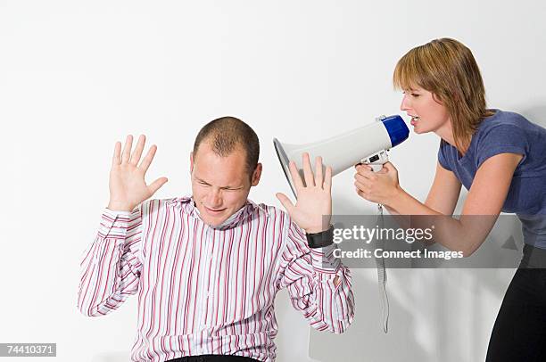 Shouting In Ear Shouting In Ear Photos and Premium High Res Pictures - Getty Images