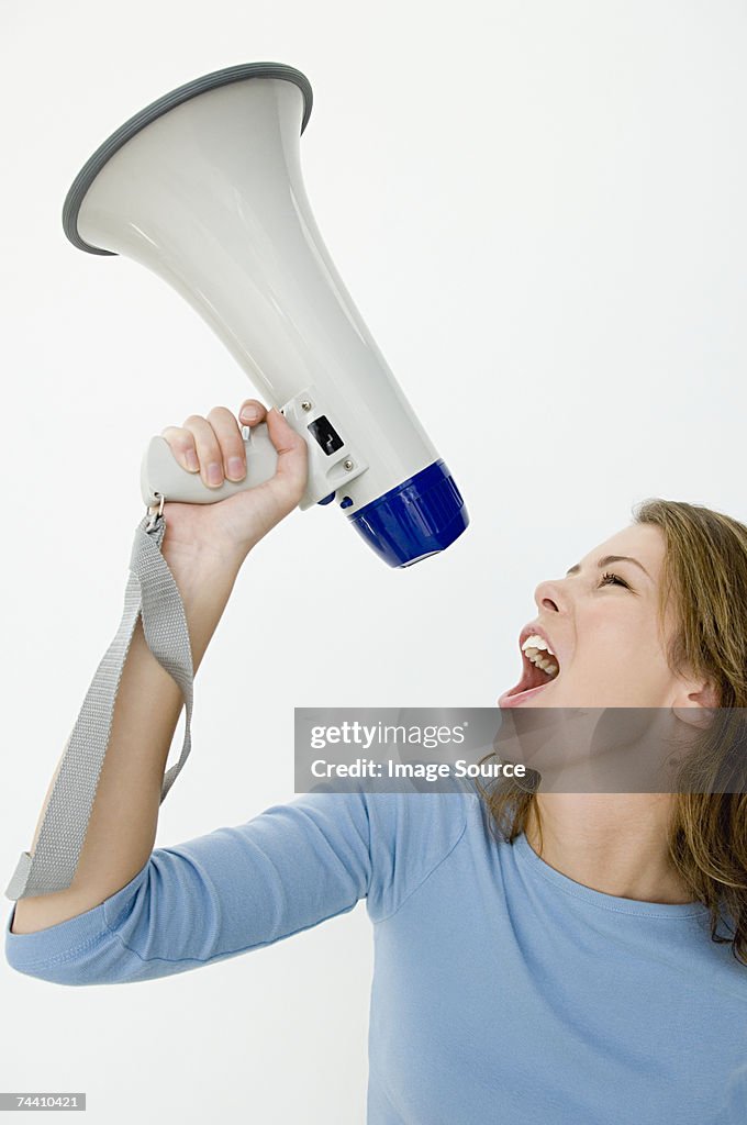 Woman using loudspeaker
