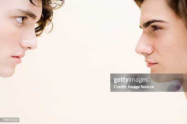 young men face to face - clashes stock pictures, royalty-free photos & images