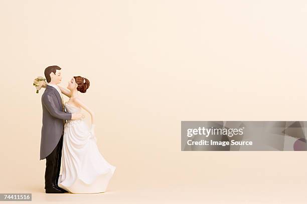 wedding figurines - wedding cake figurine stock pictures, royalty-free photos & images