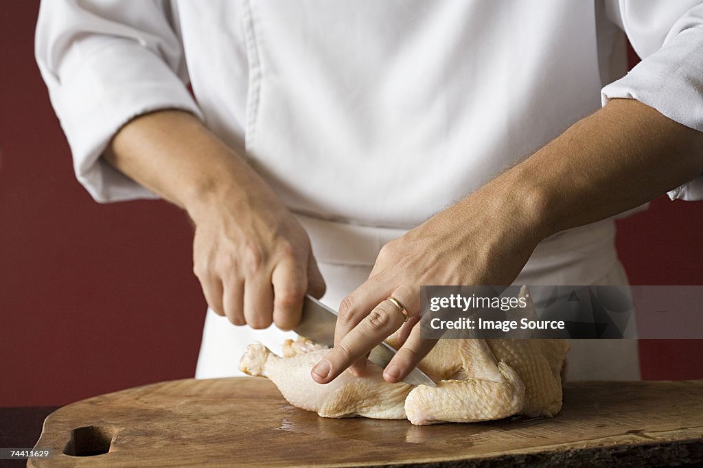 Chef preparing chicken