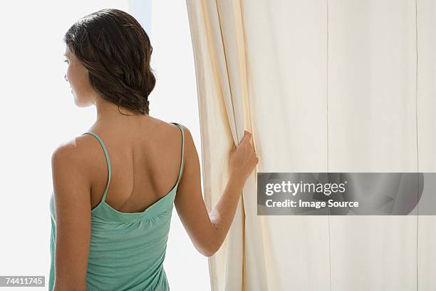 rear view of a woman - tank top back stock pictures, royalty-free photos & images