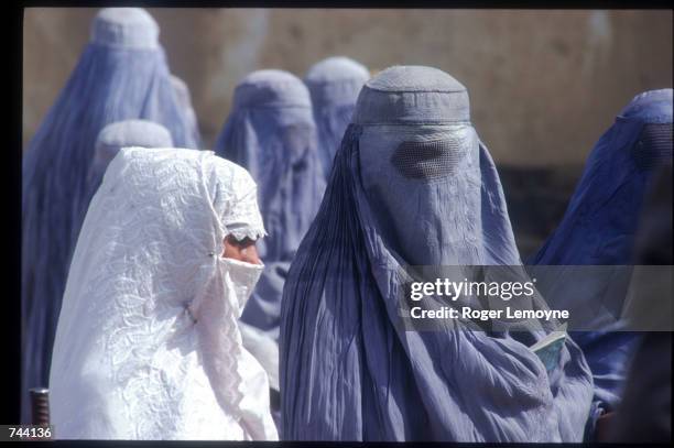 Women wear the traditional burqa October 18, 1996 in Kabul, Afghanistan. The Taliban, guerrilla soldiers who identified themselves as religious...
