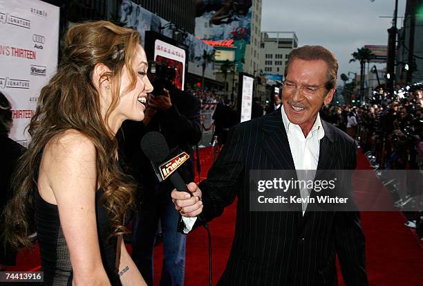 Actress Angelina Jolie is interviewed by television host Pat O'Brien before the Warner Bros. Premiere of the film "Ocean's 13" at Grauman's Chinese...